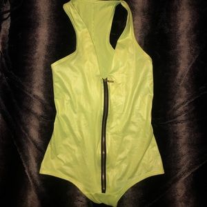 Neon yellow zip up wetlook body suit